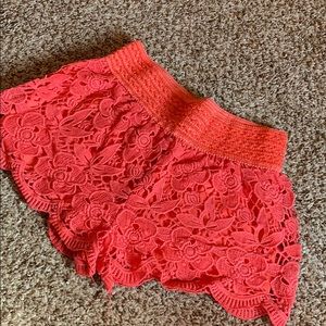 Coral, crocheted shorts